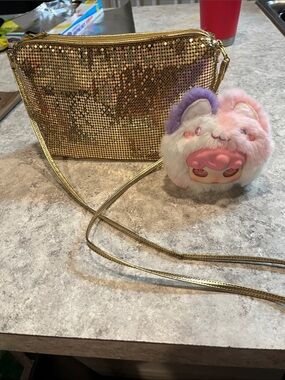 Gold Sequin Crossbody Bag with Pink & Purple Plush Charm